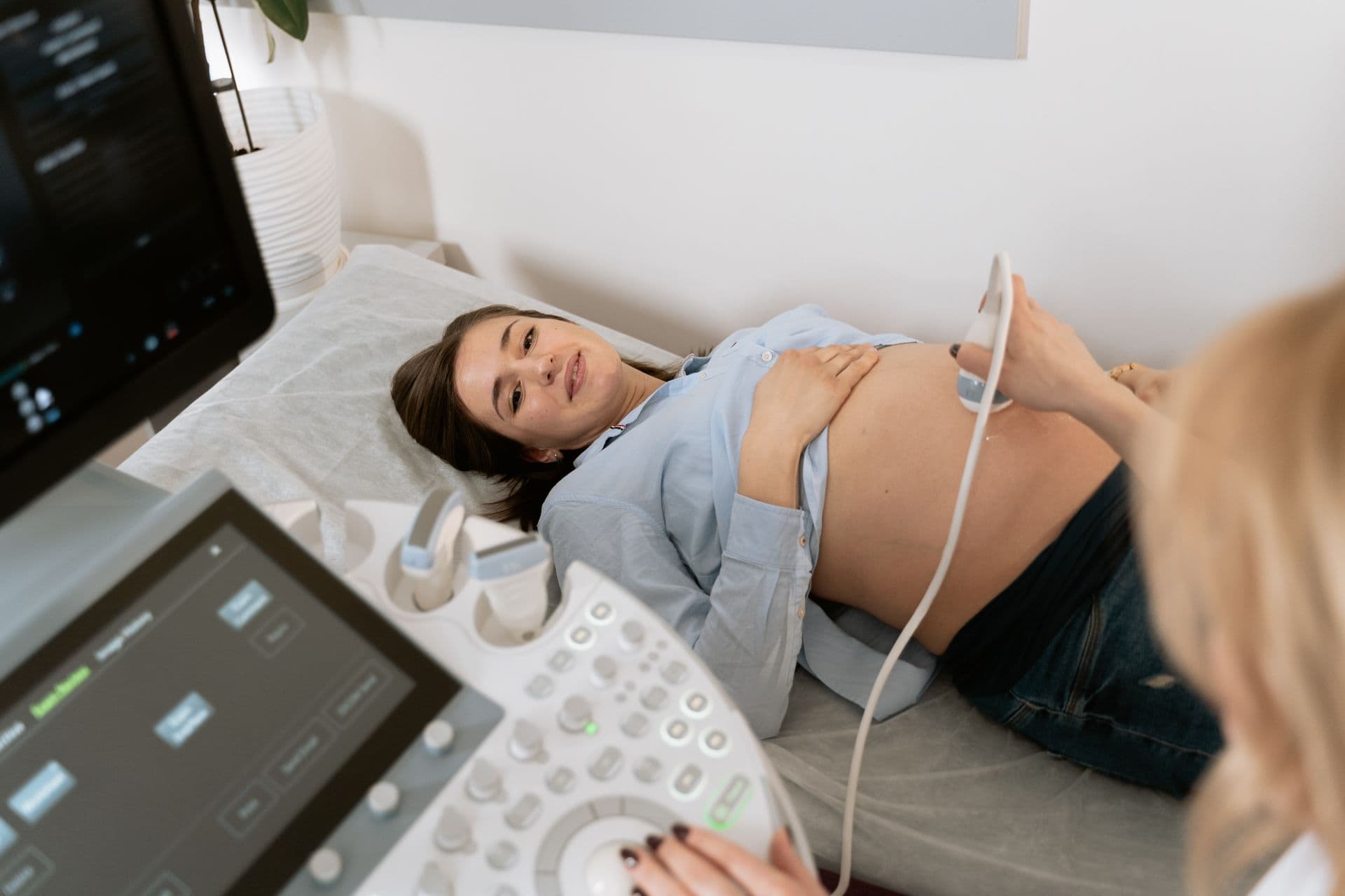 A pregnant woman undergoes an ultrasound