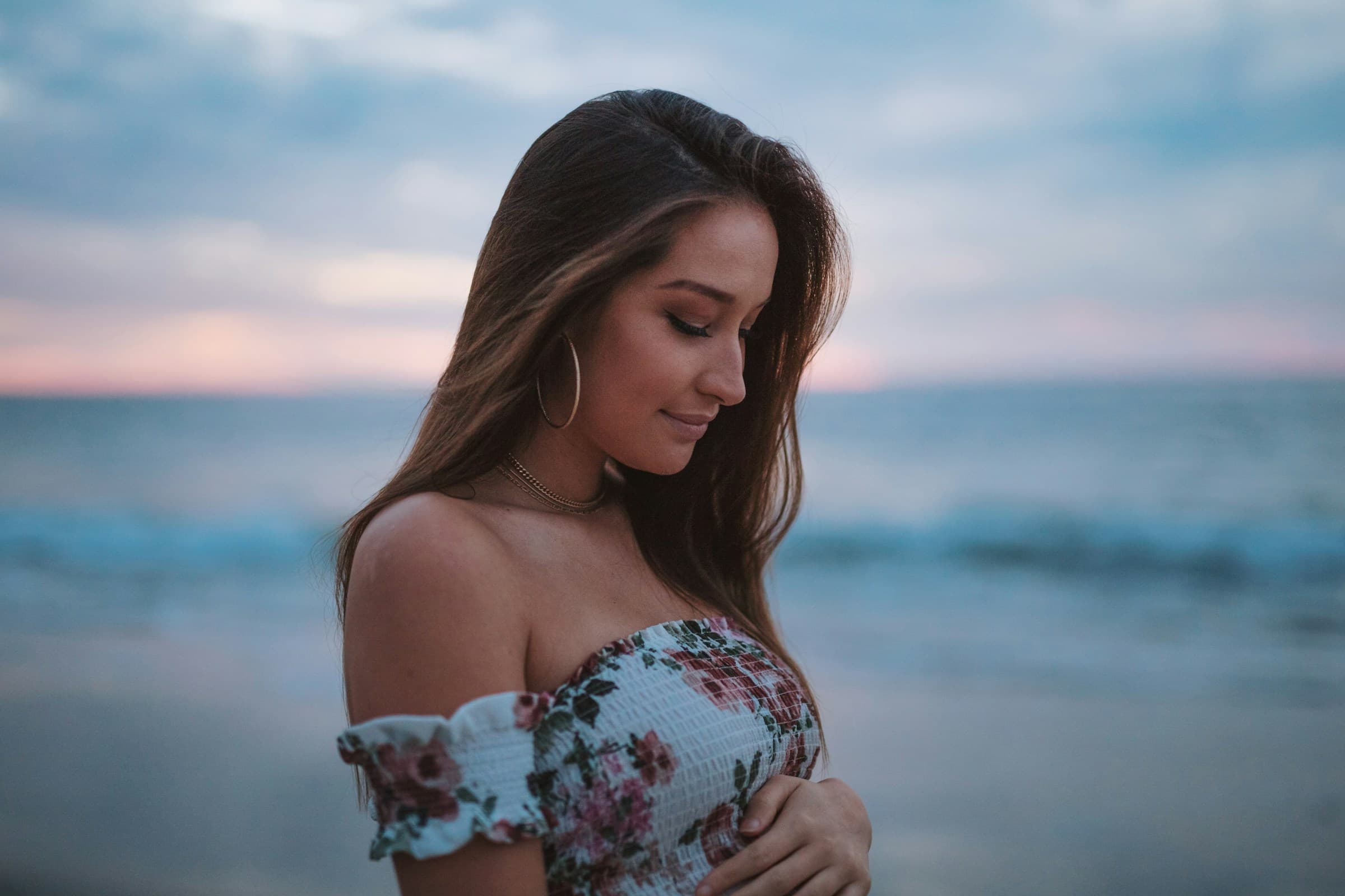 A San Diego surrogate mother stands on a beach